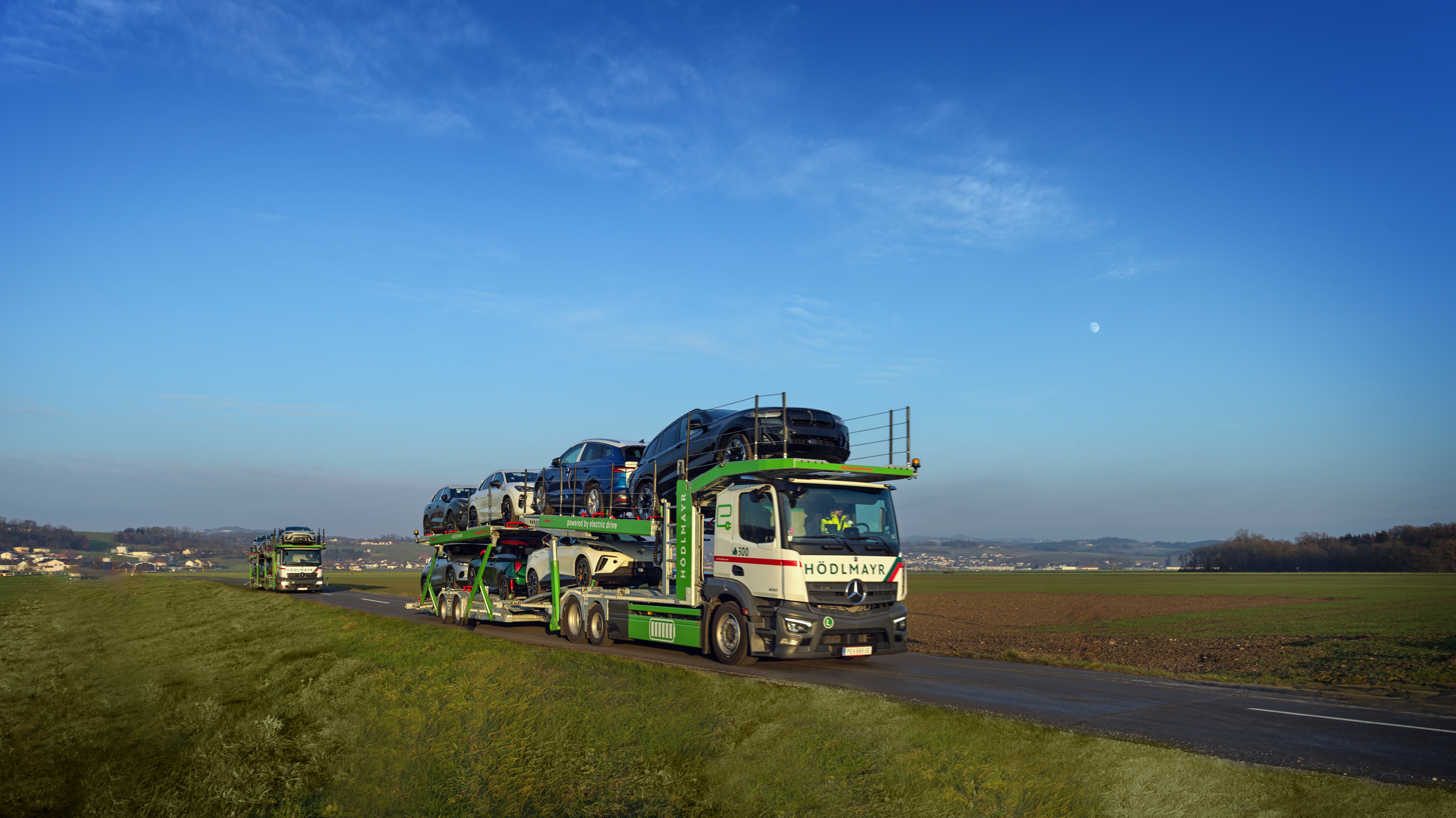 Hödlmayr electric truck driving on a rural road