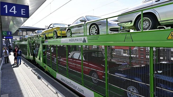 Hödlmayr rail cargo loaded with old timer cars