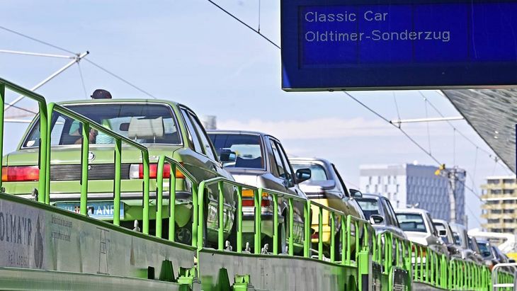 Hödlmayr rail cargo loaded with old timer cars